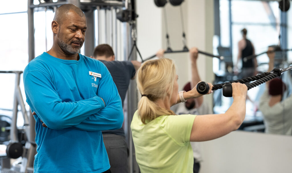 GBYMCA personal trainer working with client