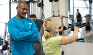 GBYMCA personal trainer working with client