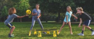 Kids playing spike-ball